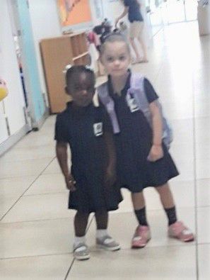 Chloe making friends on her first day of school at KBPS